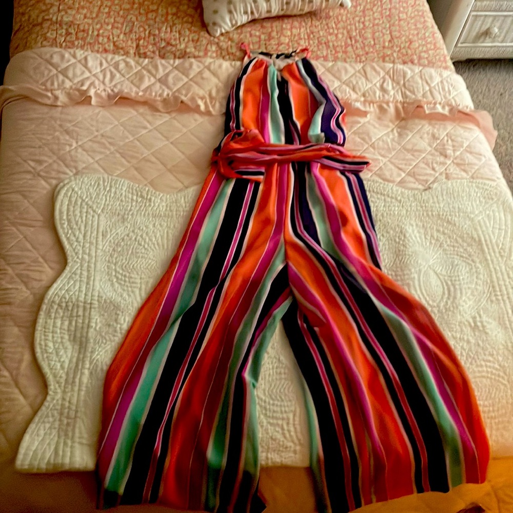 Romper that’s pink, purple and orange, blue and is very stylish